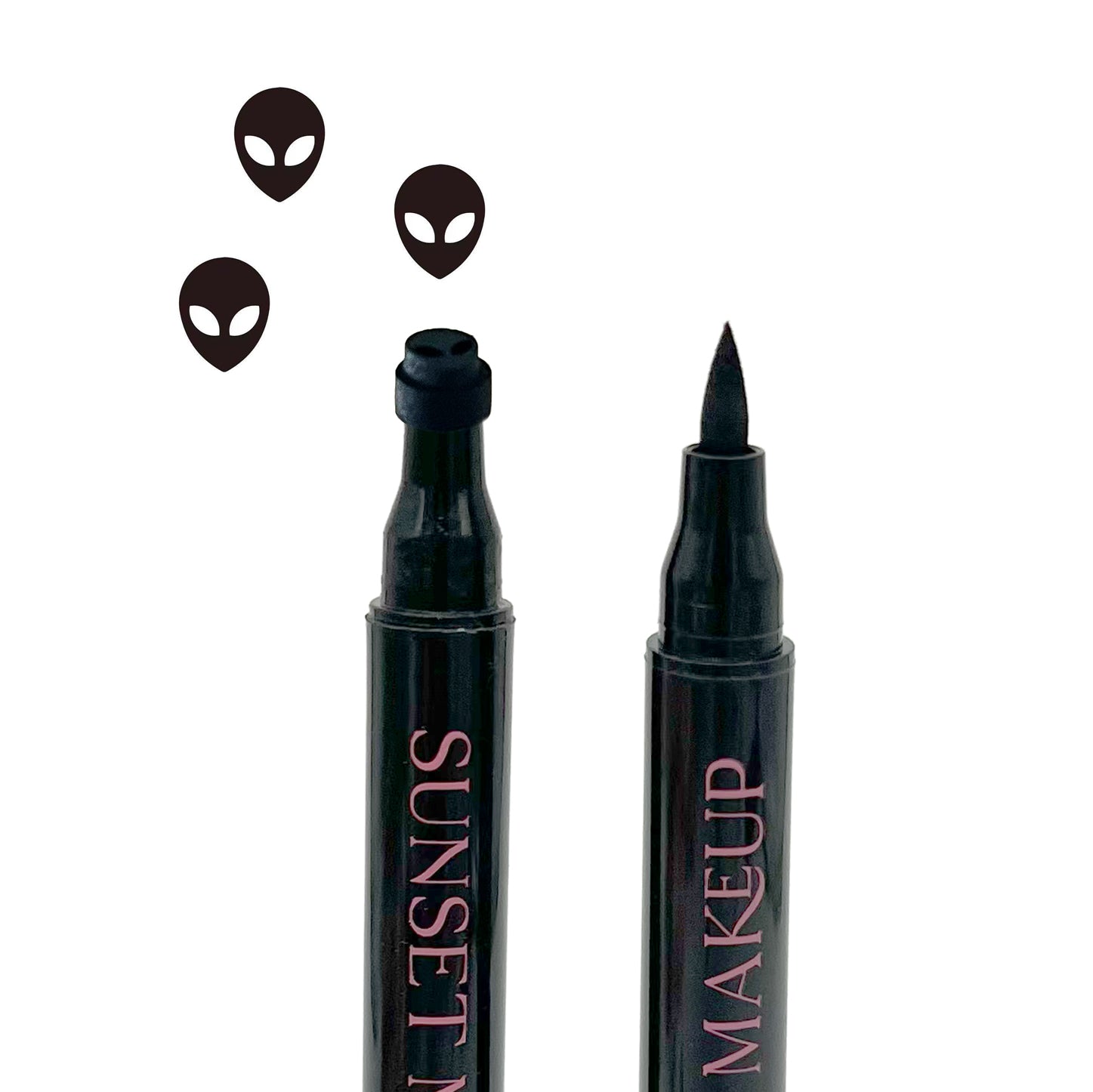 Two black Sunset Makeup alien stamp eyeliner applicators displayed on a white background with a black alien stamp impression.