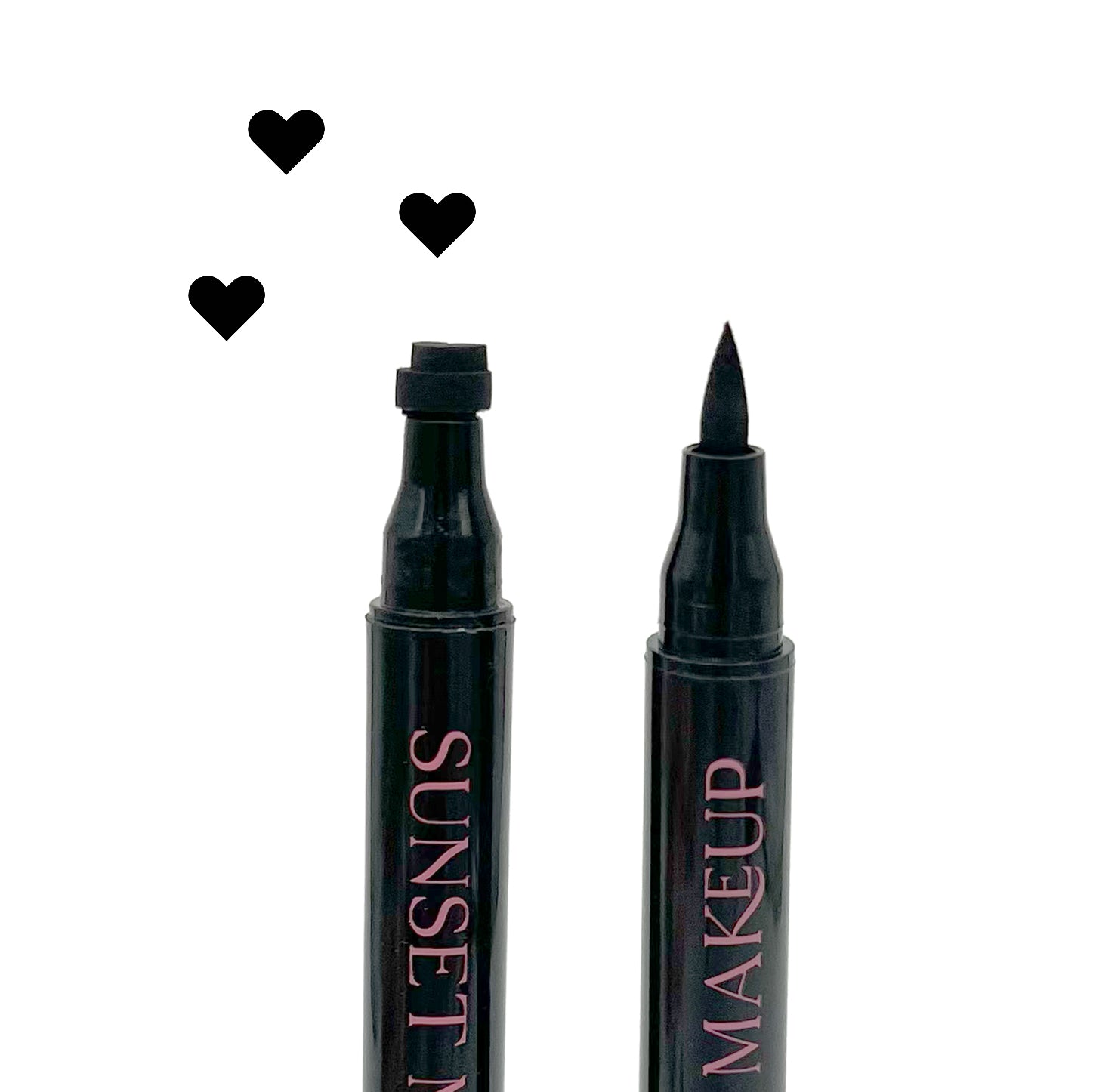 Two black Sunset Makeup heart stamp eyeliner applicators displayed on a white background with a black heart stamp impression.